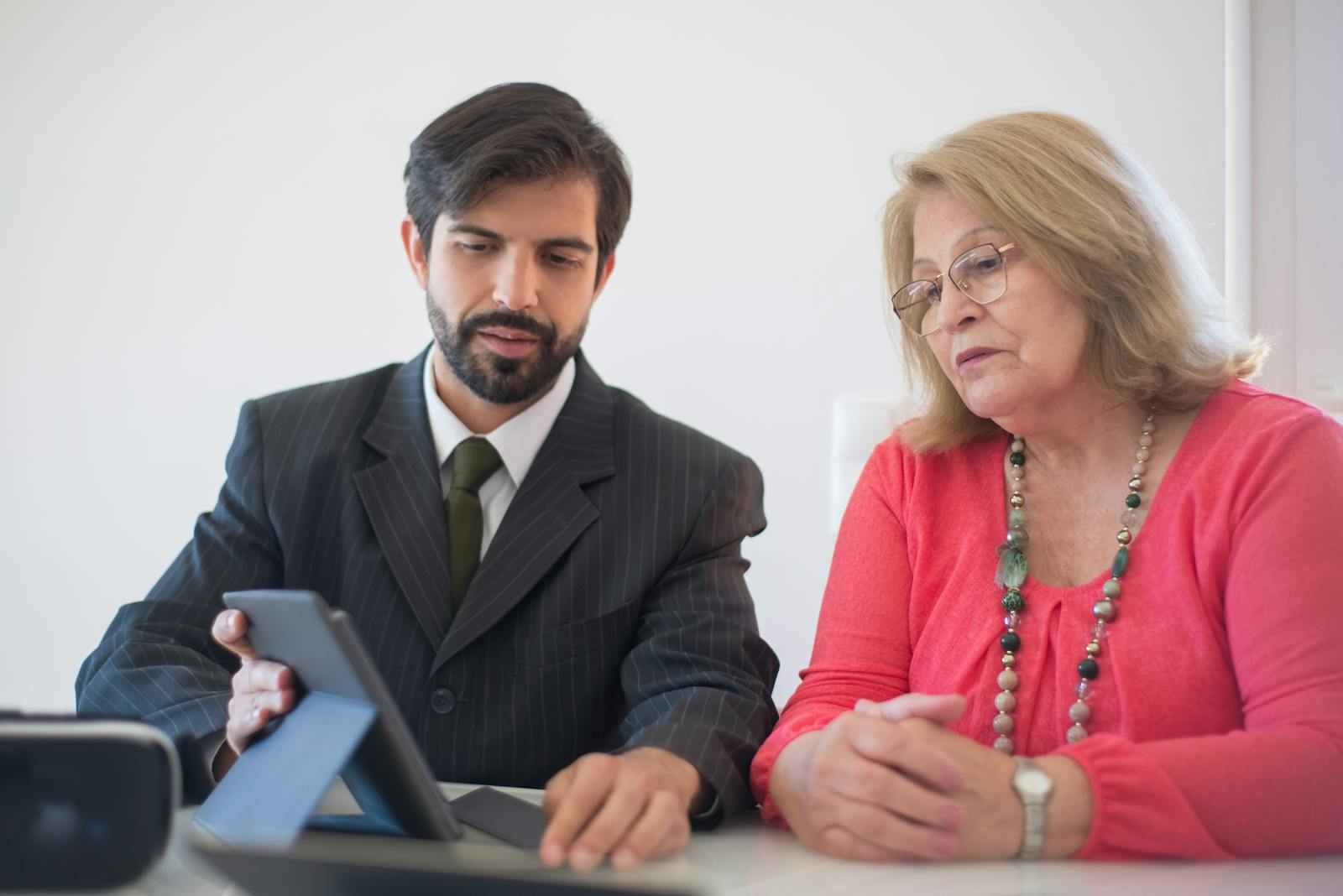 A local business operator reviewing customer follow-up on a tablet