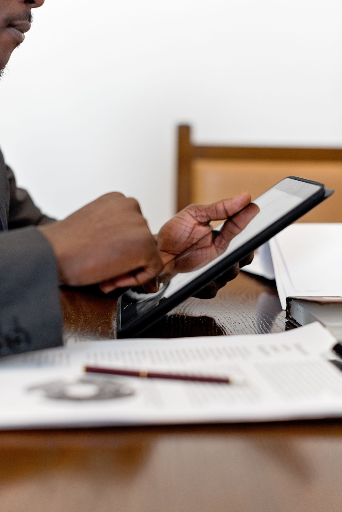 An operator reviewing service workflow details on a tablet